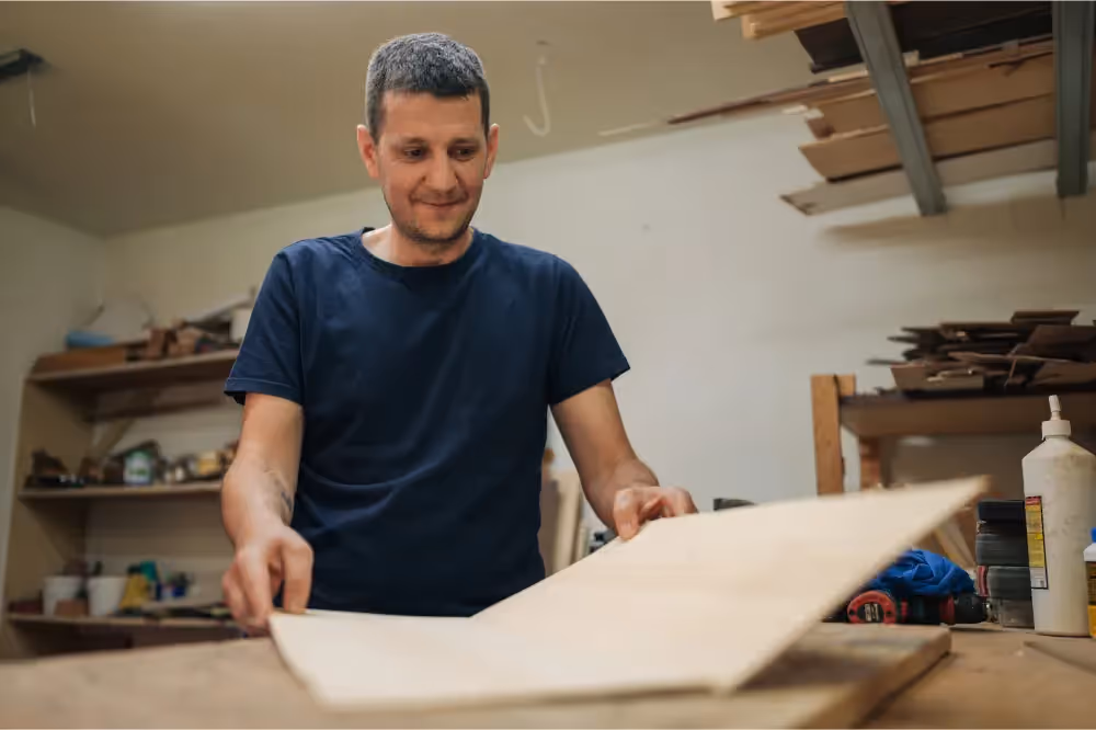 Picture of a guitar maker in the workshop
